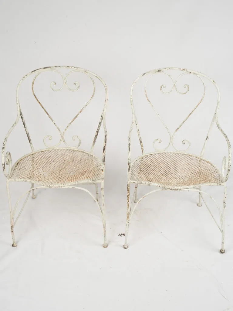 Pair of Antique French Wrought Iron Garden Armchairs w/ Heart Backs & Mesh Seats