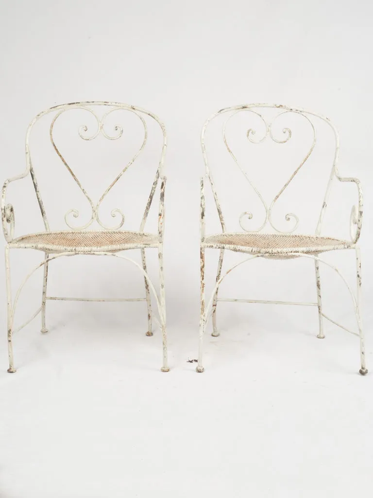 Pair of Antique French Wrought Iron Garden Armchairs w/ Heart Backs & Mesh Seats